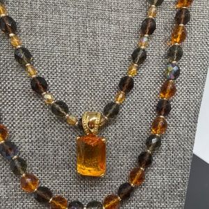 Joan Rivers bead necklaces and enhancer pendant in amber